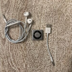 Apple Silver iPod shuffle 4th generation with Earbuds and USB Cable
